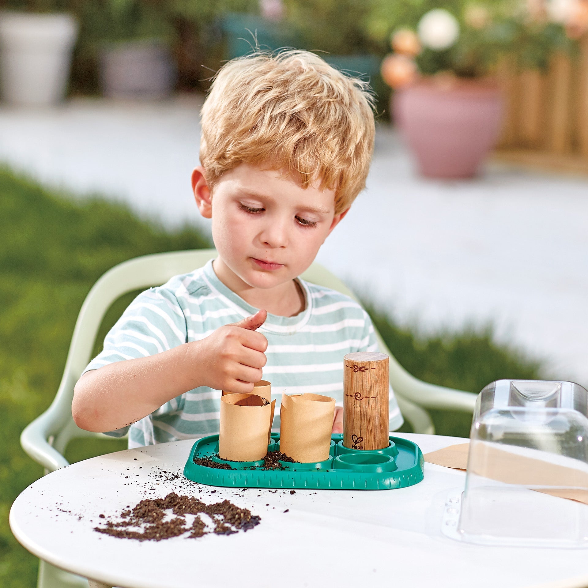 hape-growing-gardeners-green-house