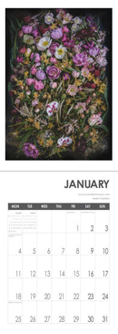 Laura Tait January 2027 spread with a floral still-life photograph and monthly grid