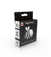 baby-touch-a-black-and-white