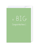Certainly! Here’s a rewritten version using the product name: The “Big Congratulations” card is a green New Zealand greeting card featuring playful, varied white text that says, “A BIG Congratulations!” Centered on a blurred white and gray background, the card is shown slightly open. Blank inside for your personalized message, this card comes with an envelope included—perfect for any celebratory occasion.