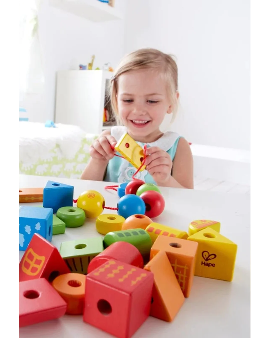 hape-string-along-shapes