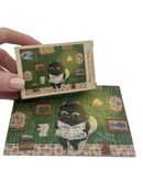 The Puzzle Collab Black Cat on The Toilet 99 Piece Micro Puzzle