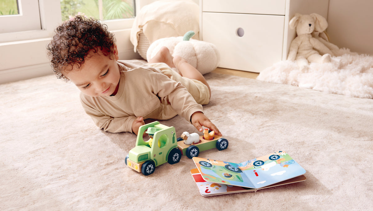 hape-land-the-rumbling-tractor