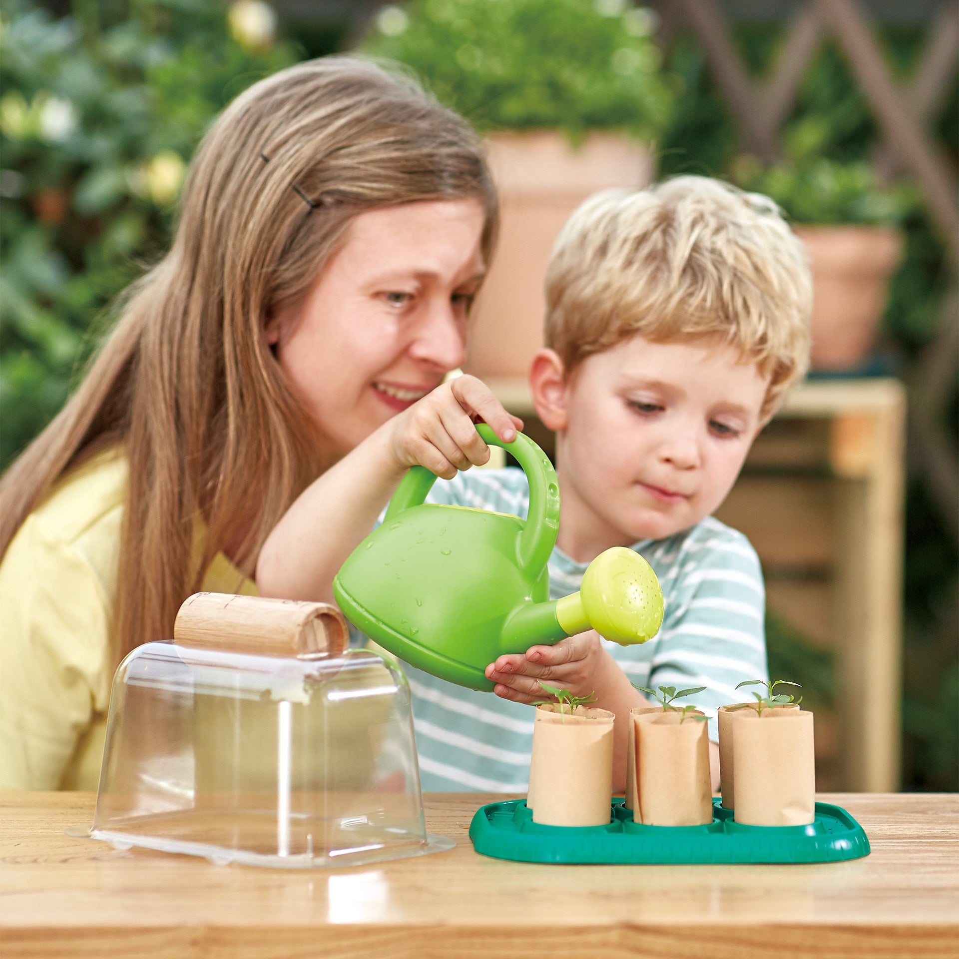 hape-growing-gardeners-green-house