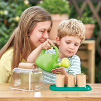 hape-growing-gardeners-green-house