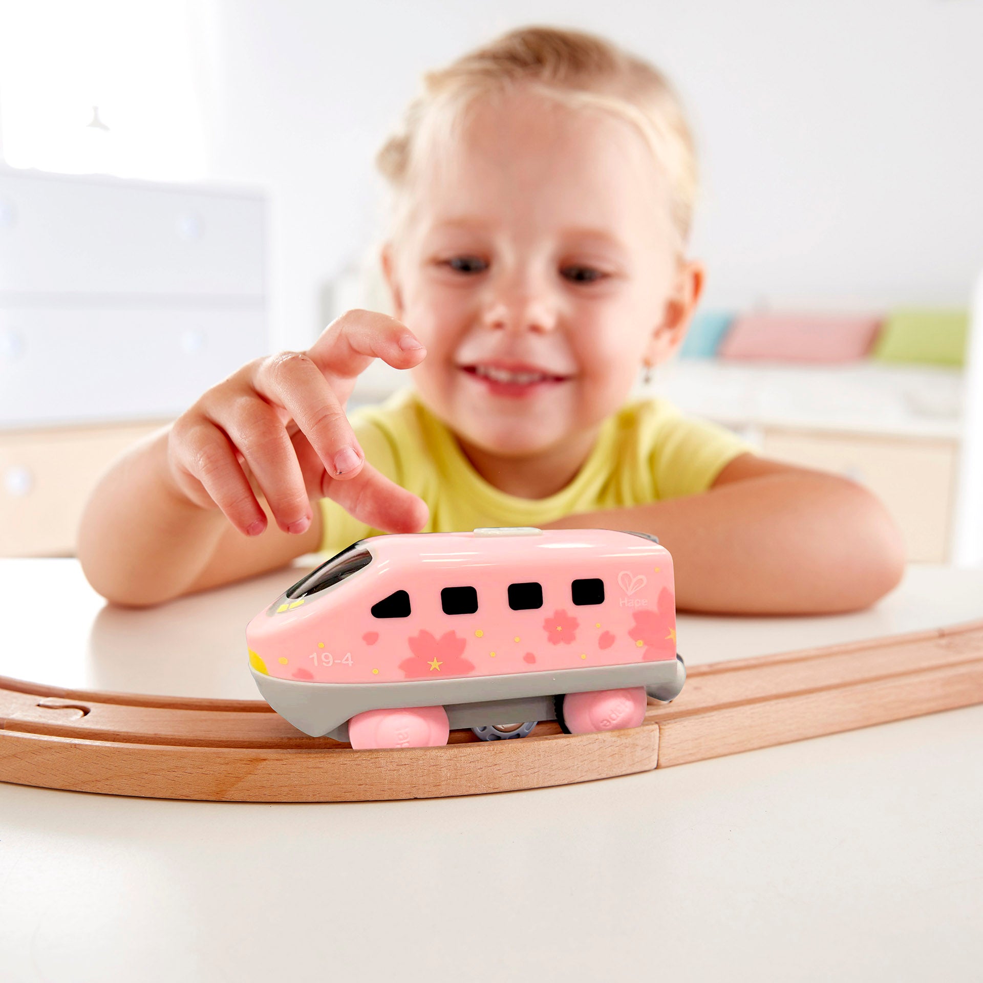 hape-battery-powered-inter-city-loco-pink
