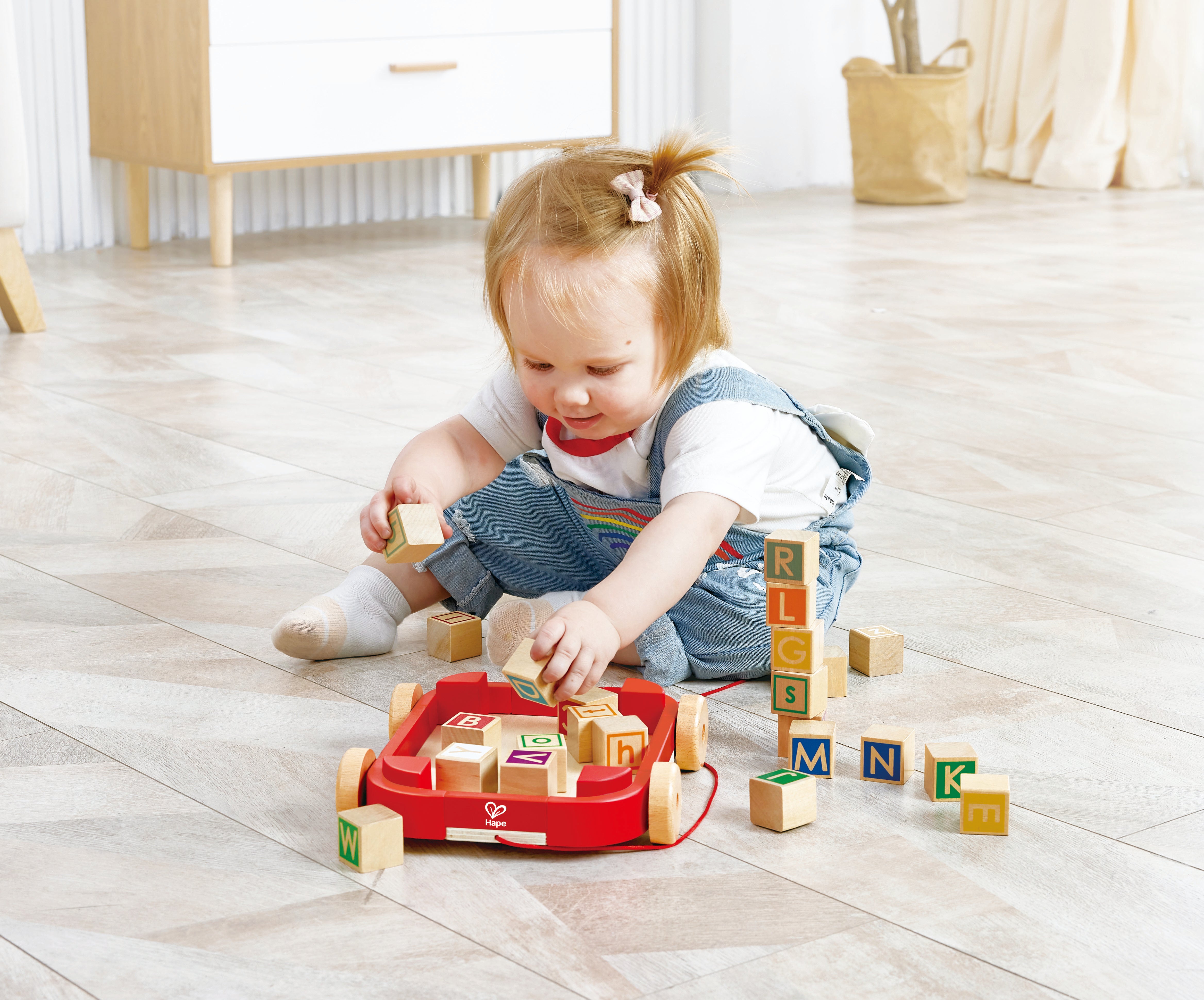 hape-pull-along-cart-w-stacking-blocks