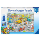 Ravensburger Vehicles in the City 100-piece puzzle box with city traffic and service vehicles